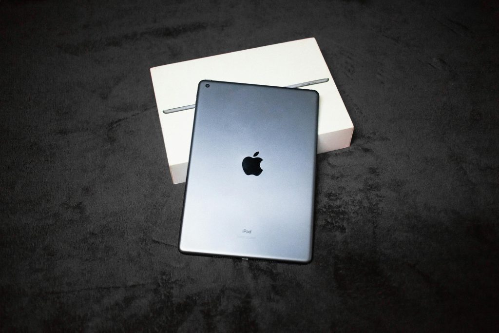 High-quality image of an iPad with a box, perfect for product photography showcasing technology.
